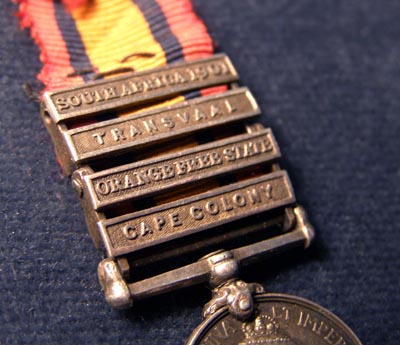 QSA Miniature Medal. Four Clasps.